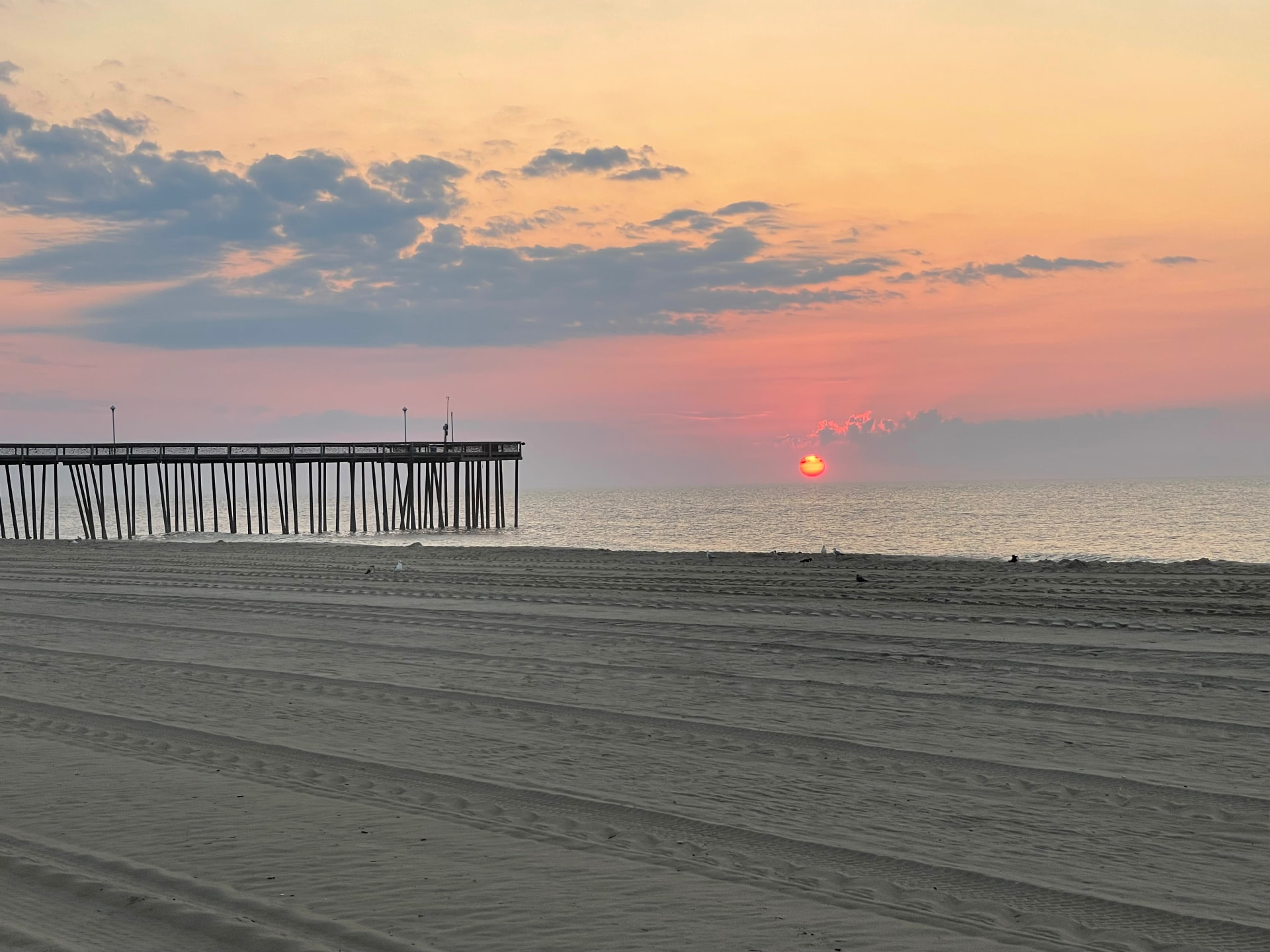 Sunrise over the Ocean City, Maryland fishing pier